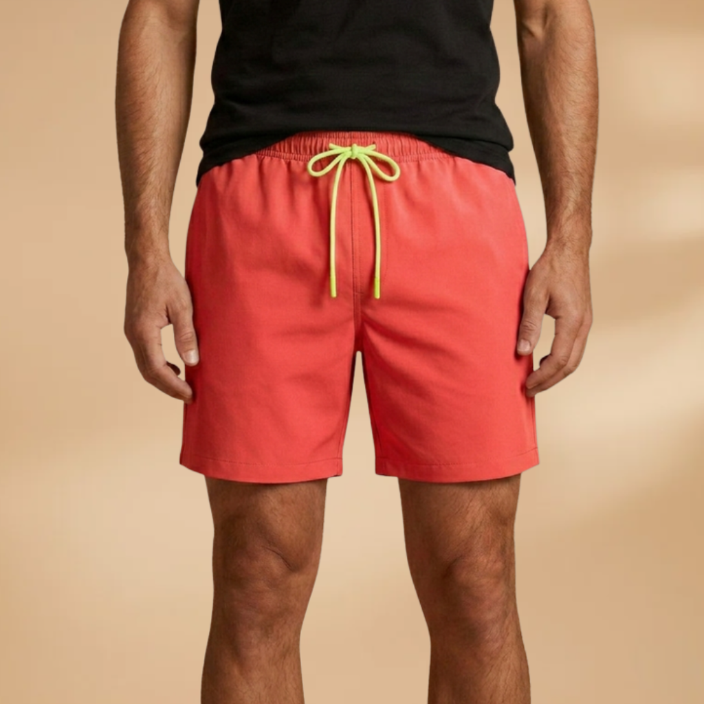 Versatile men's quick-dry swimwear, mid-length design & elastic stretch waistband for comfort.