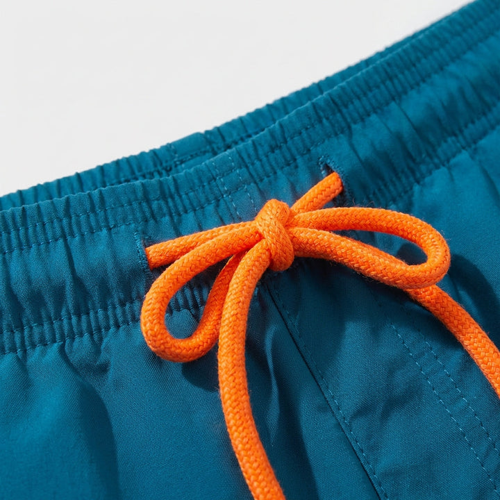 Men's quick-dry active shorts, elastic waist, suitable for swimming and casual wear.