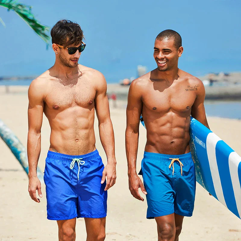 Classic men's quick-dry swim shorts, elastic waist, a must-have for any beach trip.