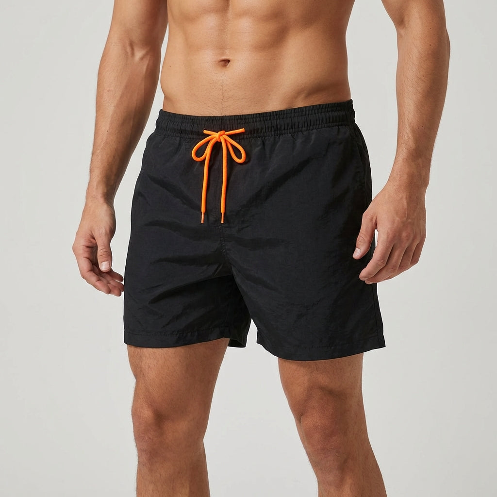 Blue quick-dry men's swim shorts with elastic waist for comfortable active beachwear.