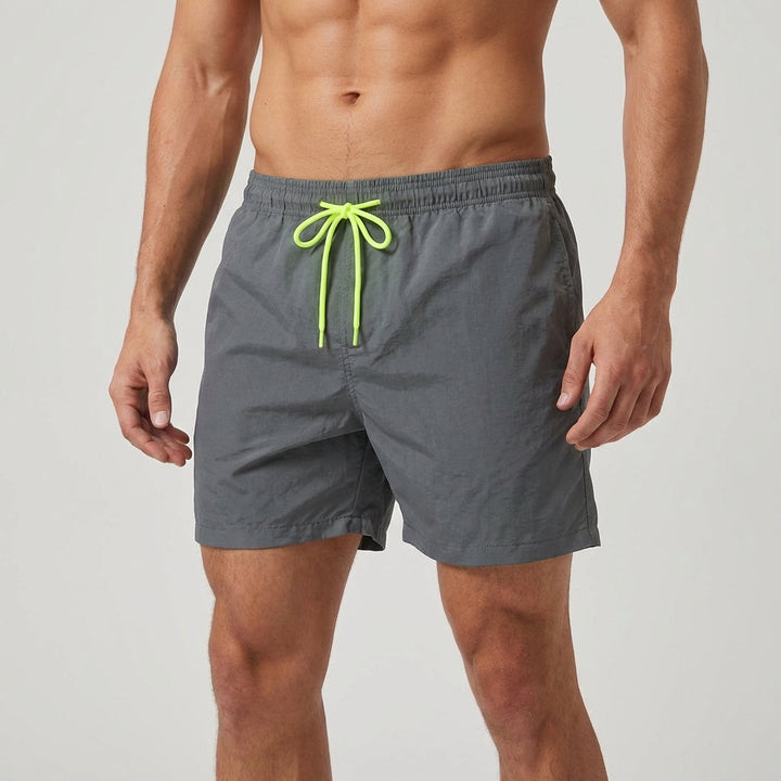 Lightweight men's beach shorts, quick-dry fabric, with a comfortable elastic waist.
