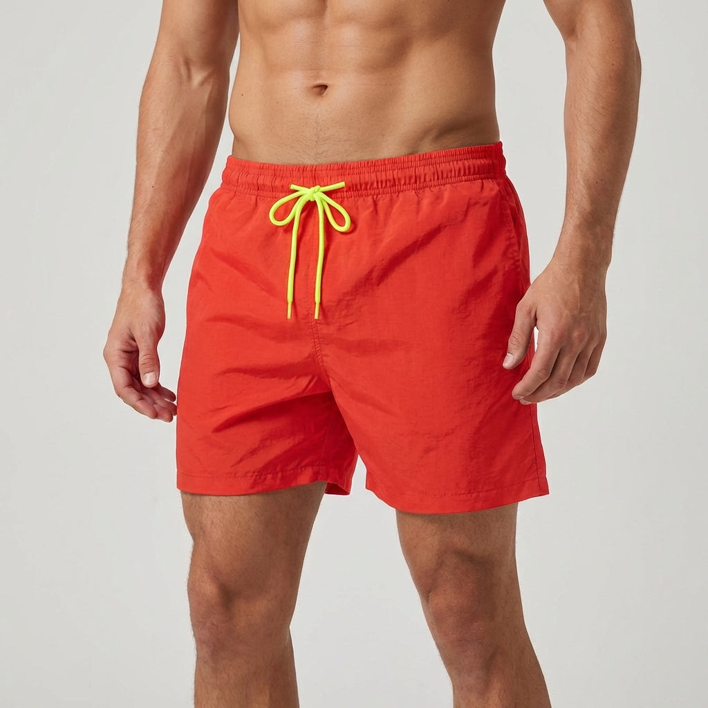 Patterned men's quick-dry swim shorts, elastic waist, versatile summer swimwear.