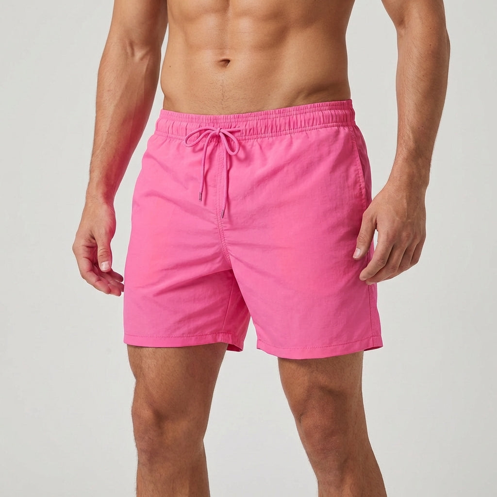 Durable quick-dry men's swim trunks with elastic waistband for ultimate comfort.