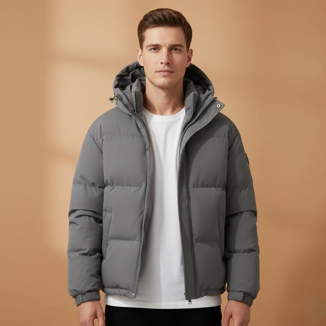 Close-up of the men's quilted jacket's warm down insulation and zip closure.