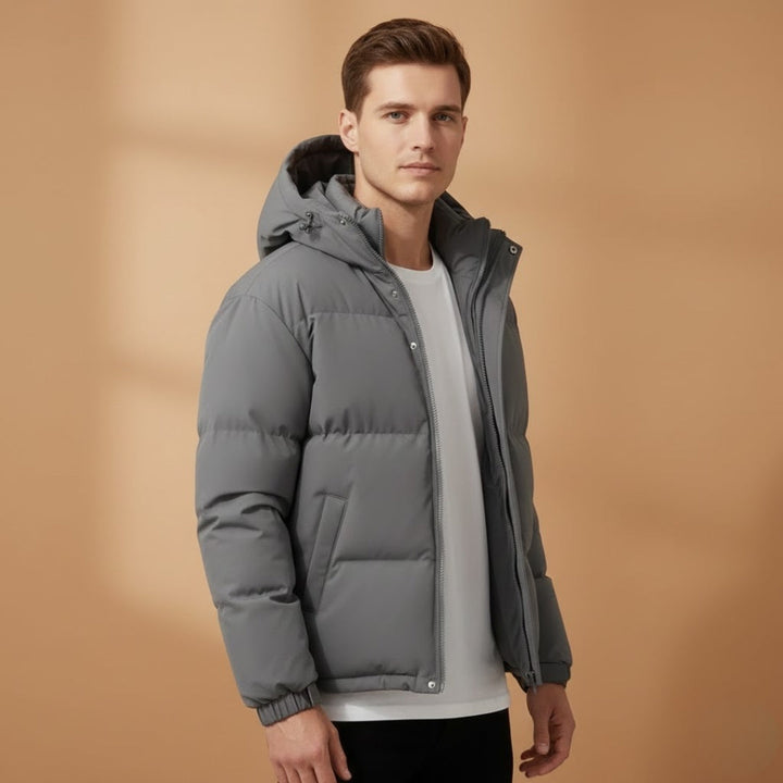 Stylish men's hooded jacket, featuring a quilted design and all-weather warmth.