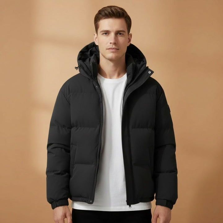 Detailed shot of the men's zip-closure jacket, highlighting its winter-ready design.