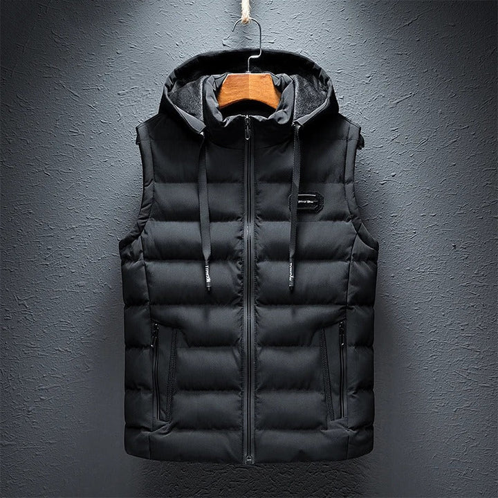 Men's quilted hooded vest in black, offering stylish warmth for casual wear.