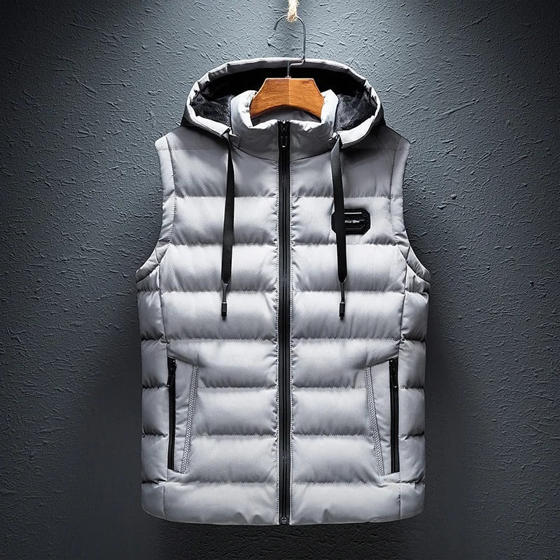 Side view of a warm, casual men's quilted vest with a convenient hood.