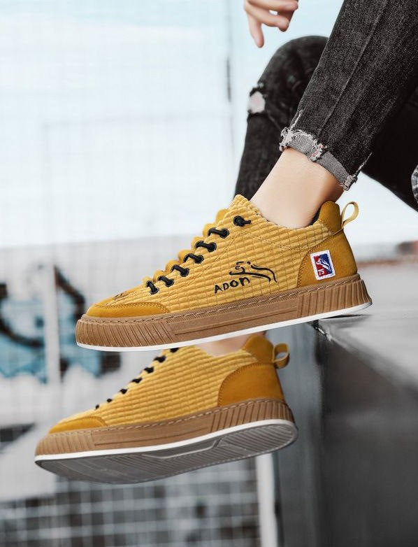 Comfortable men's lace-up sneakers; quilted low-top design for everyday casual street style.