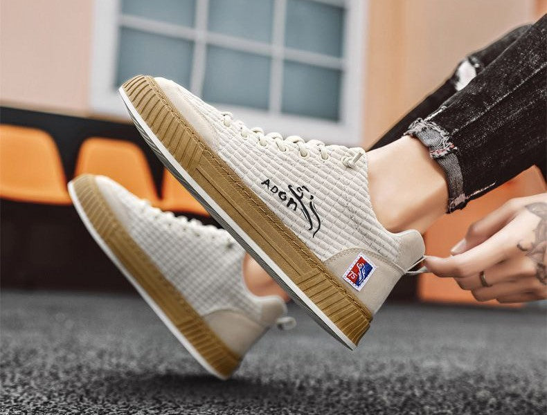Stylish men's low-top quilted sneakers. Lace-up, comfortable everyday wear. Perfect for street style.