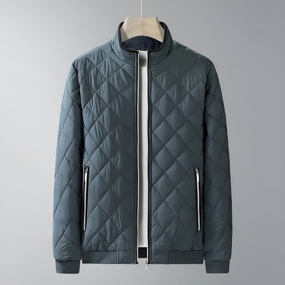 Men's quilted thermal jacket with zip pockets, perfect for casual wear.