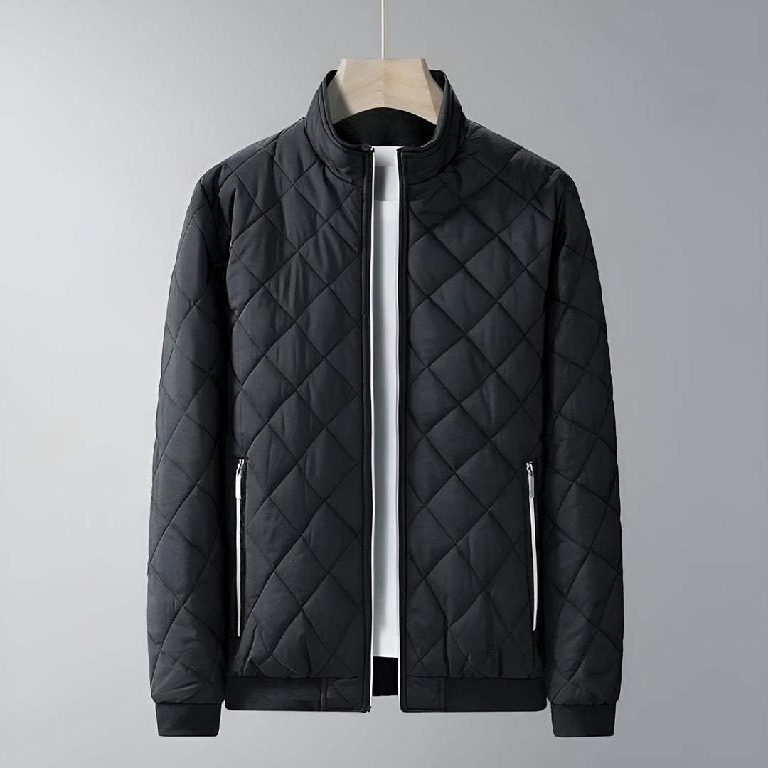 Warm men's fleece-lined quilted jacket with stand collar and zip pockets.