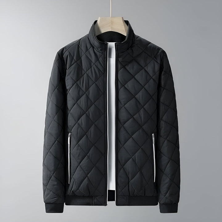 Warm men's fleece-lined quilted jacket with stand collar and zip pockets.