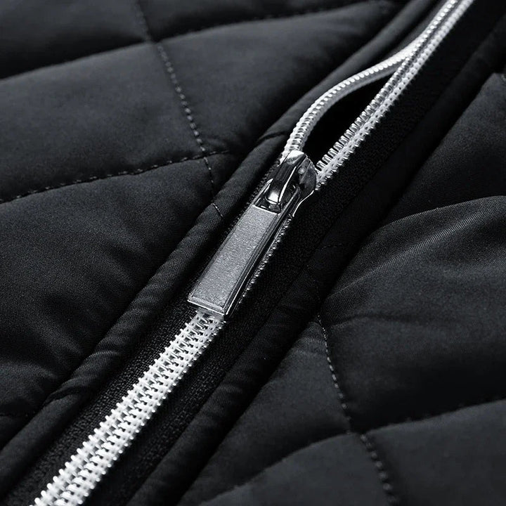 Durable men's quilted jacket with thermal lining and convenient zip pockets.