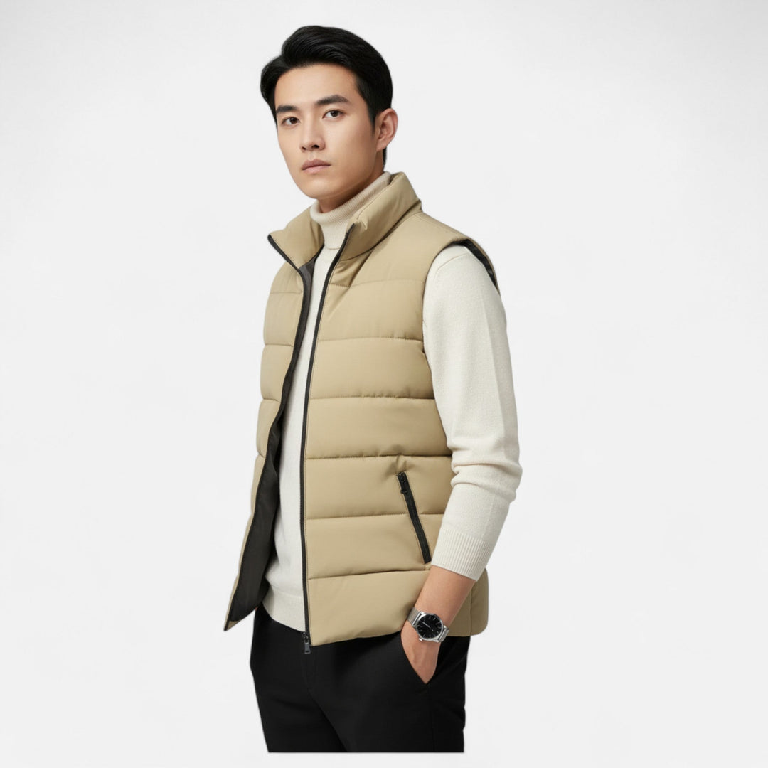 Close-up of men's quilted vest zipper and detailing, black color