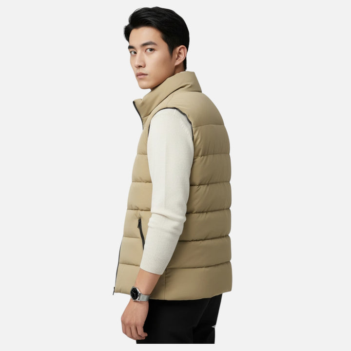 Man wearing a beige lightweight winter vest, perfect for casual wear