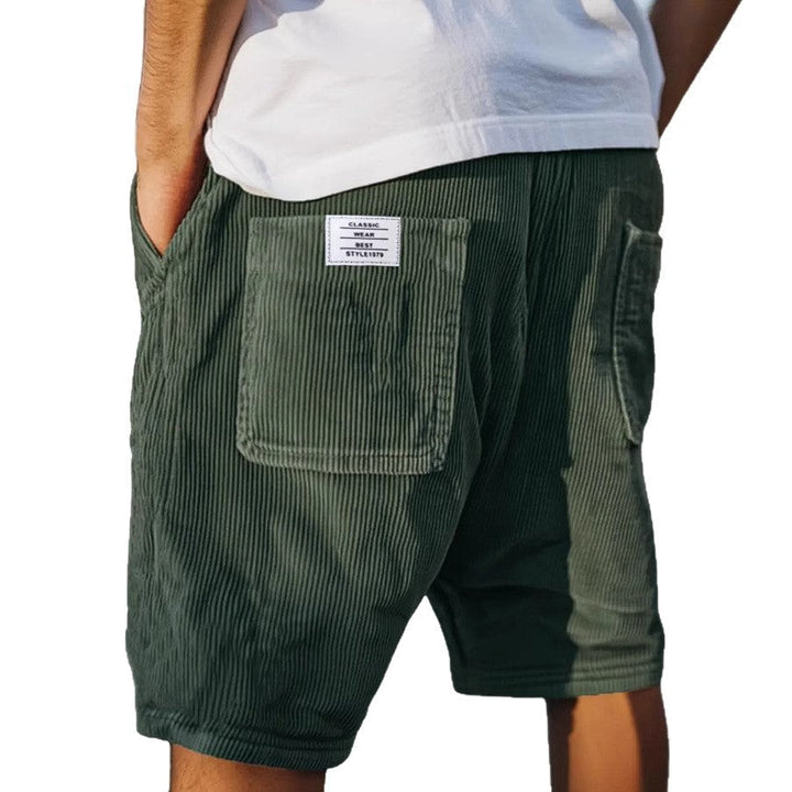Effortlessly stylish men's textured tailored shorts, perfect for a refined summer casual look.