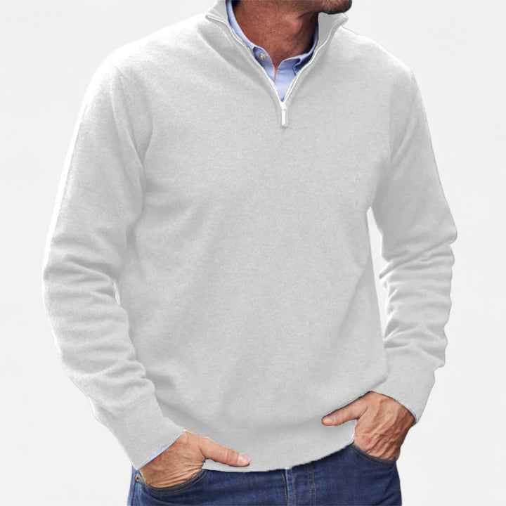 Men's zipper knit sweater in beige, highlighting its soft yarn and refined design.