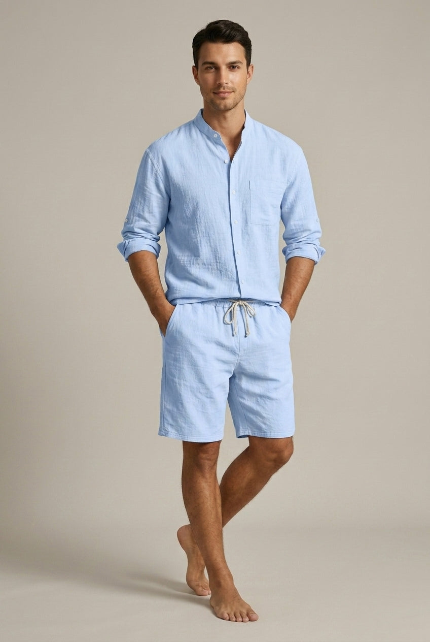 Men's casual apparel set with a relaxed band collar shirt and comfortable summer shorts, perfect for holidays.