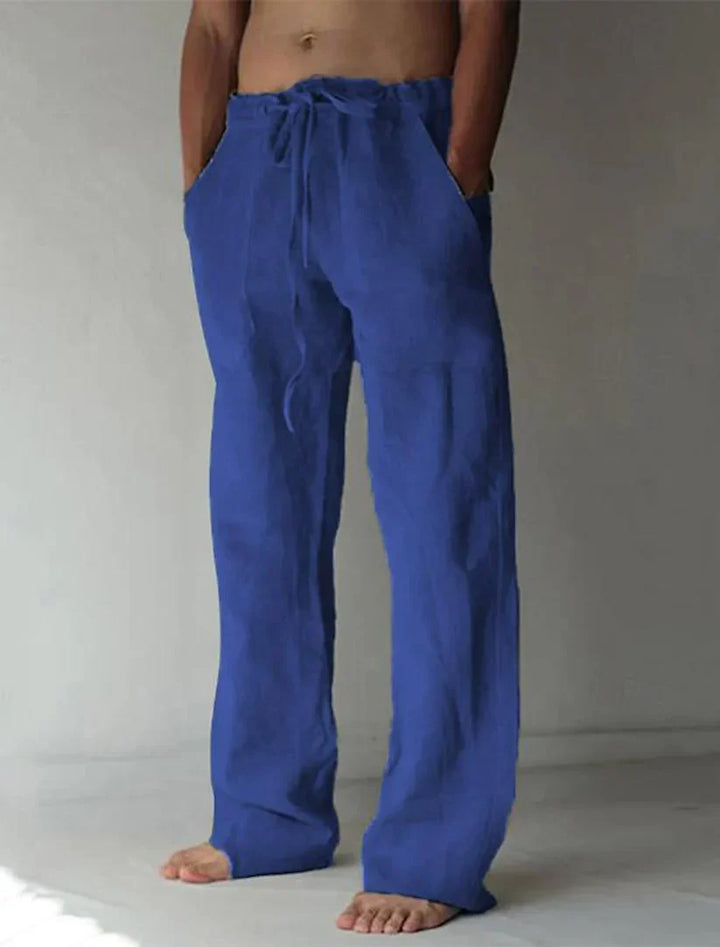 Man wearing comfortable relaxed fit baggy pants. Stylish loose bottoms for casual, all-day wear & streetwear.