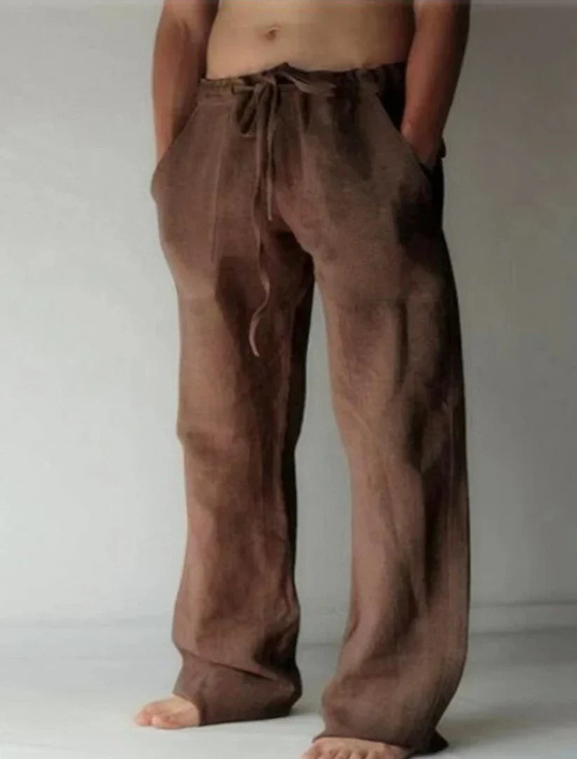 Front view of men's relaxed fit baggy pants. Comfortable, loose casual bottoms for modern fashion.
