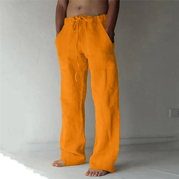 Side view of men's baggy pants, relaxed fit for easy movement. Stylish casual bottoms for street style.