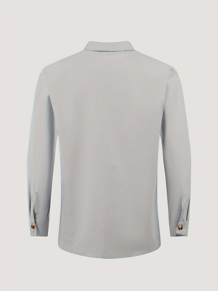Stylish men's two-piece beach set. Relaxed fit summer shirt with mandarin collar & matching drawstring trousers.