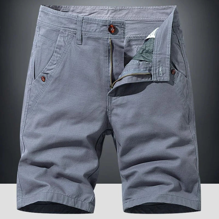 Men's relaxed fit beige chino shorts for summer. Comfortable everyday wear for warm weather.
