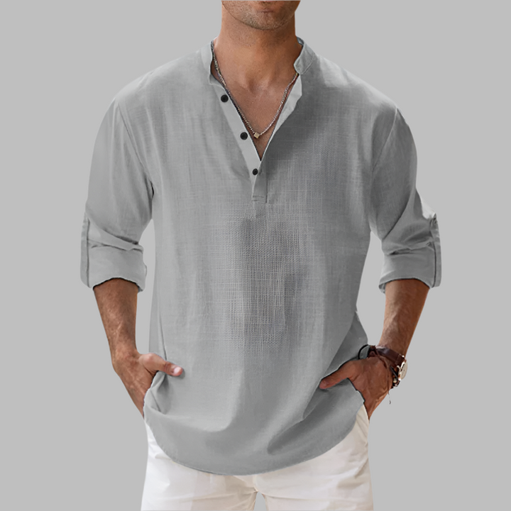 Man wearing a versatile style button-down linen shirt for summer fashion.