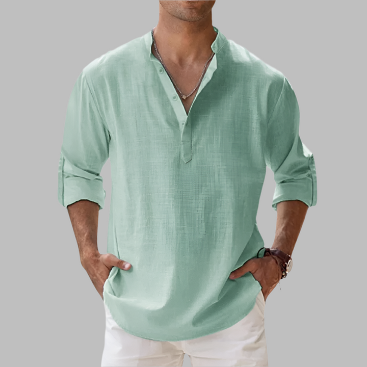A crisp, new men's linen shirt designed for breathable summer casual wear.