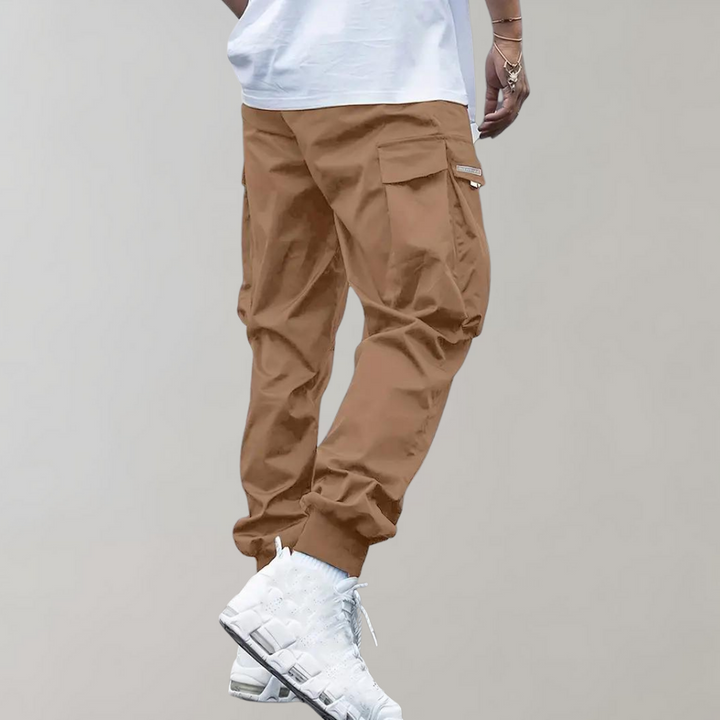 Breathable fabric gray cargo trousers for men, perfect for streetwear and travel.