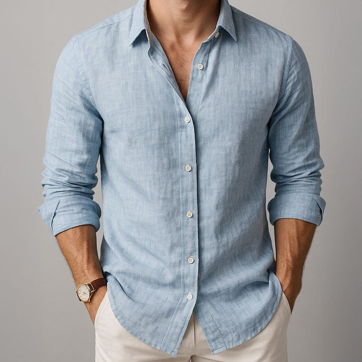 Men's relaxed fit button-down shirt, perfect for casual summer style. Lightweight and breathable for warm weather.