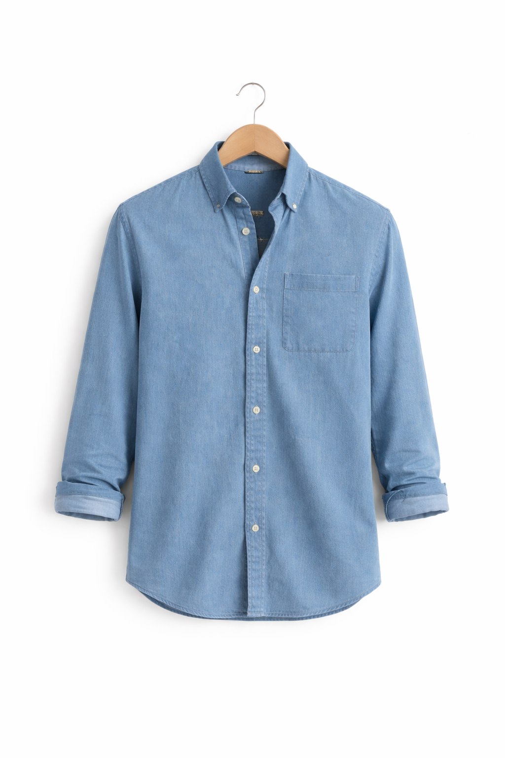 Close-up detail of men's relaxed fit button-front long sleeve shirt fabric texture.
