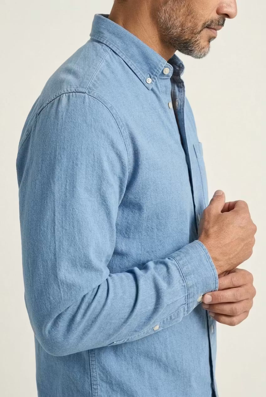 Navy men's relaxed fit long sleeve button-front shirt, a versatile addition to any wardrobe.