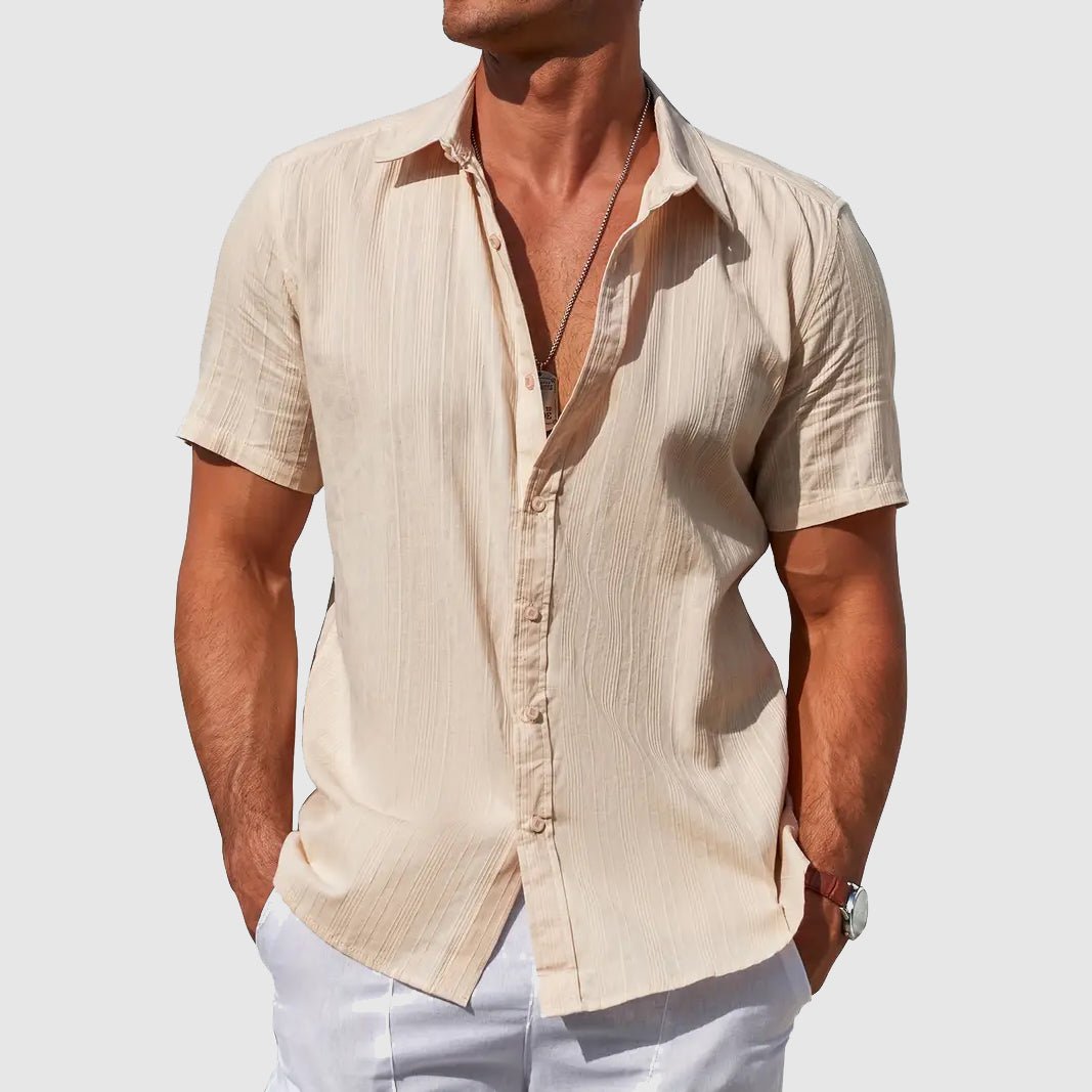 Comfortable men's short sleeve button-front shirt with a relaxed summer fit, ideal for everyday casual wear.