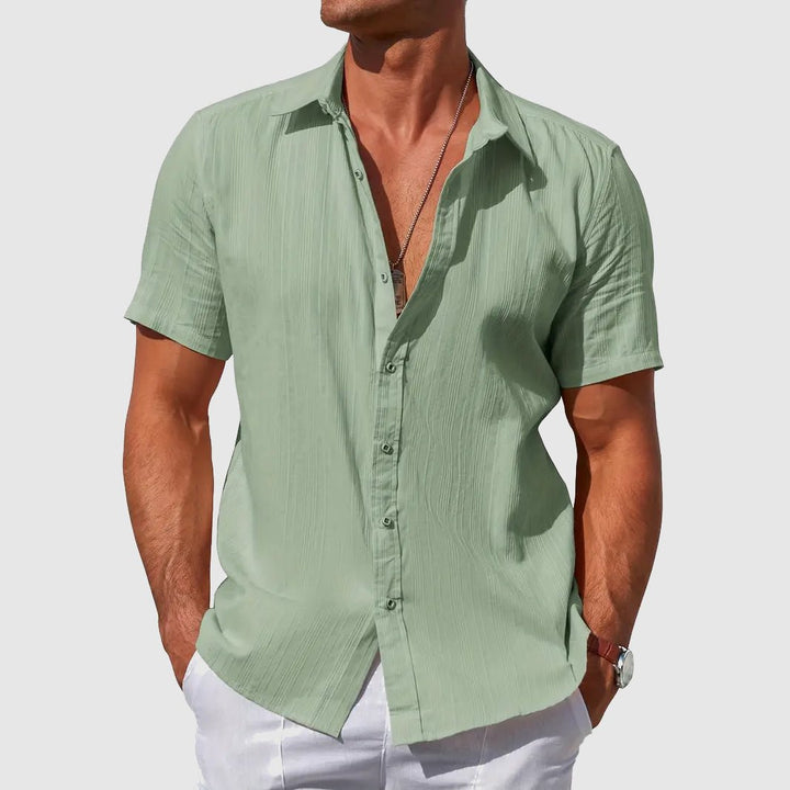 Men's everyday button-front short sleeve shirt with a relaxed fit, perfect for summer casual and outdoor events.