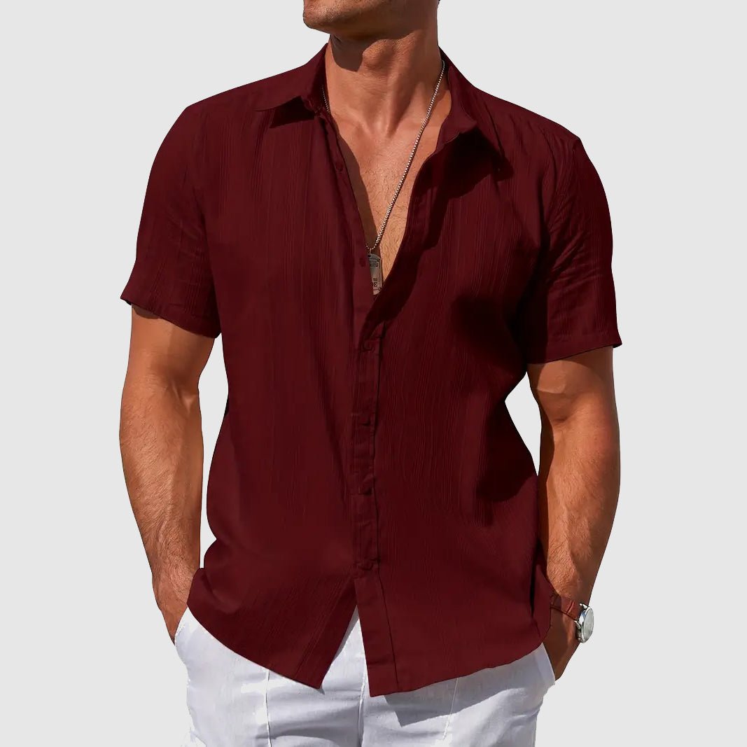Breathable men's relaxed fit short sleeve button-front shirt, excellent for casual summer and warm-weather activities.