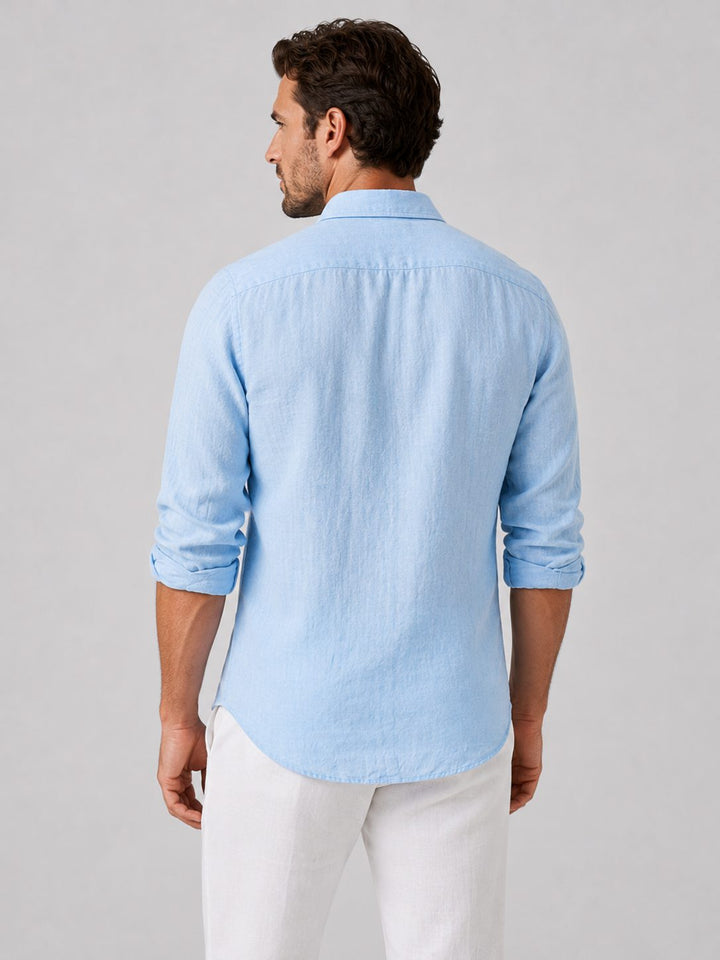 Relaxed fit men's button-up shirt, collared, offering effortless casual style.