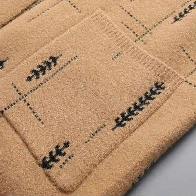 Side view of a men's relaxed cardigan, highlighting its comfortable fit & practical patch pockets.