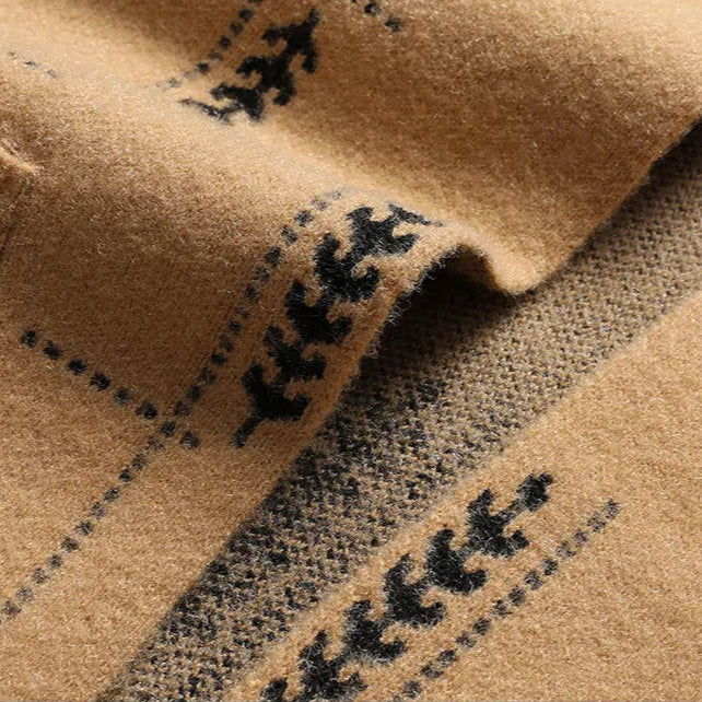 Effortless men's relaxed fit cardigan with patch pockets, ideal for cozy, casual layering.