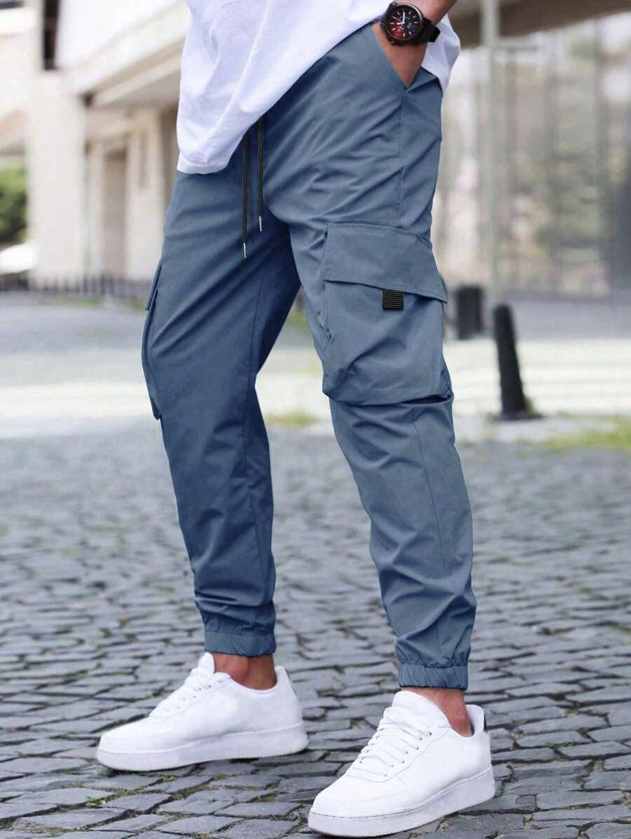 Stylish men's relaxed fit jogger pants, comfortable for everyday wear. Versatile casual utility pants for men.