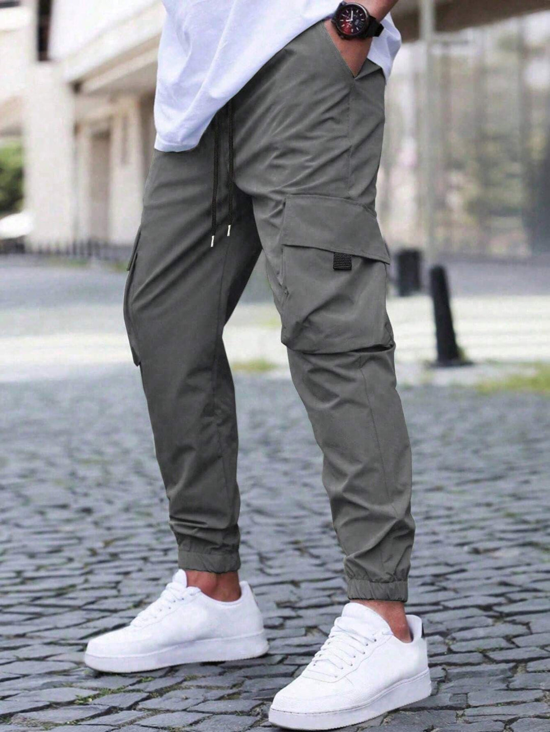 Fashionable men's relaxed fit utility cargo pants, combining jogger style with everyday comfort for men.