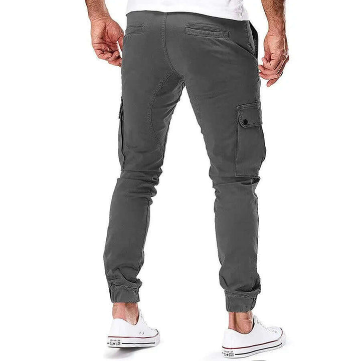 Black men's relaxed fit cargo joggers, essential for comfortable athleisure & trendy streetwear looks.
