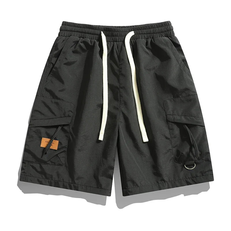 Men's utility cargo shorts, relaxed fit, featuring an elastic waist for ultimate casual summer comfort.