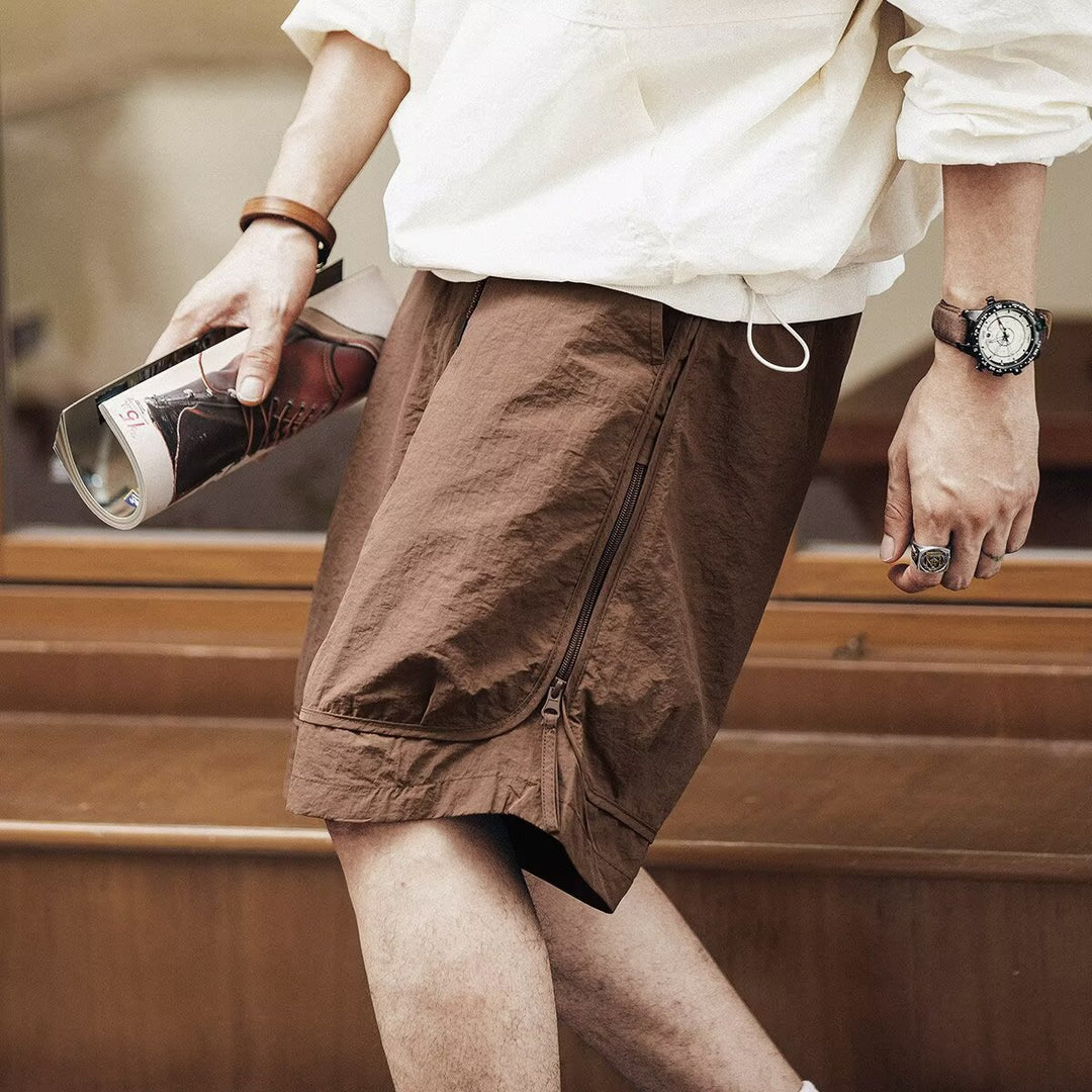 Stylish men's utility cargo shorts, relaxed fit, knee-length, featuring a comfortable drawstring waist.