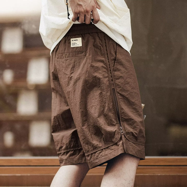 Soft cotton men's relaxed cargo shorts, knee-length, drawstring waist, great for everyday summer style.
