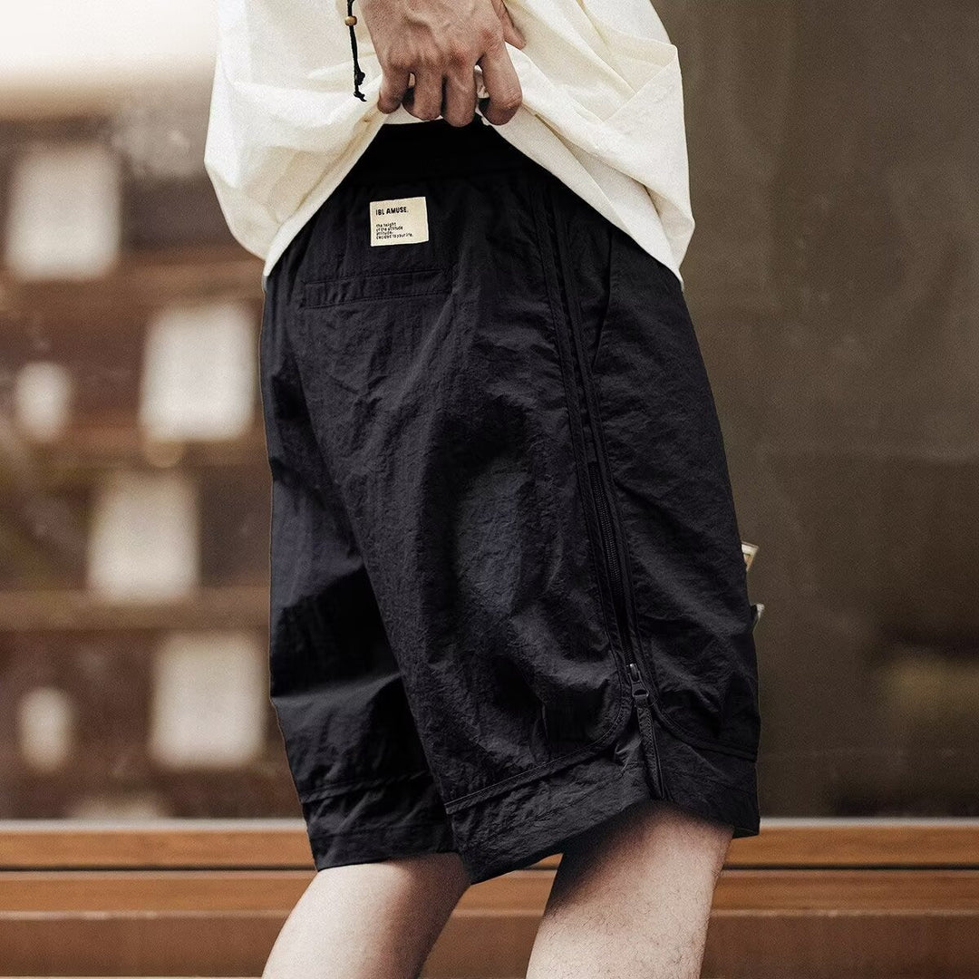 Men's knee-length cargo shorts, relaxed fit, convenient drawstring waist for ultimate casual comfort.