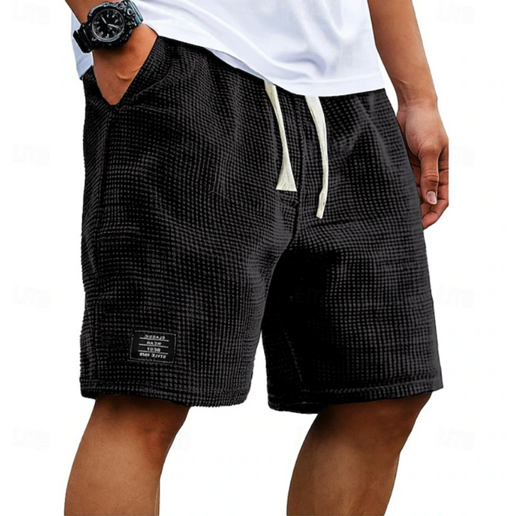 Stylish men's casual summer shorts with a relaxed fit for warm weather fashion.
