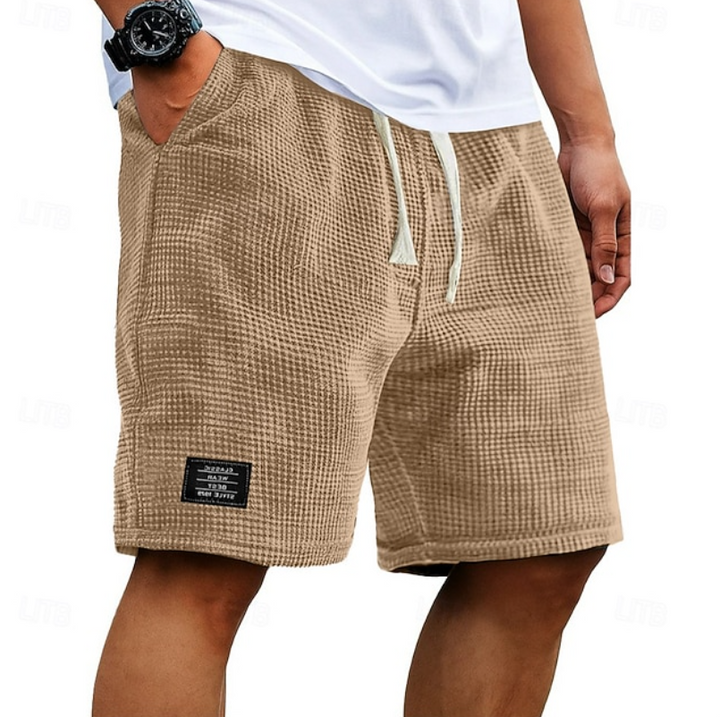 Comfortable & breathable men's relaxed fit shorts, ideal for versatile summer everyday wear.