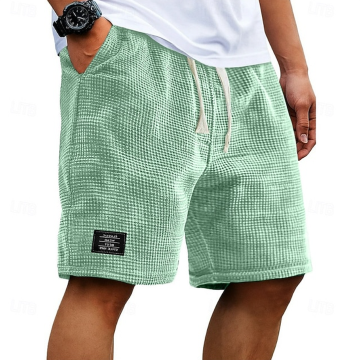 Men's summer relaxed fit casual shorts, perfect bottoms for warm weather & everyday comfort.
